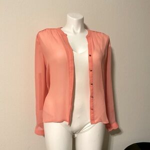 Jennifer Lopez sheer long sleeve blouse